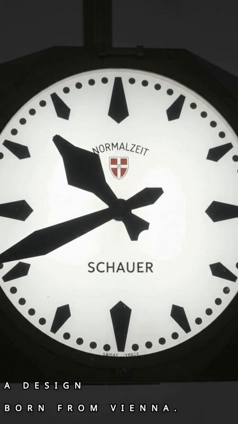 Close view of the octagonal Normalzeit clock dial