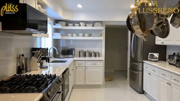Renovated white kitchen with open shelving and stainless appliances